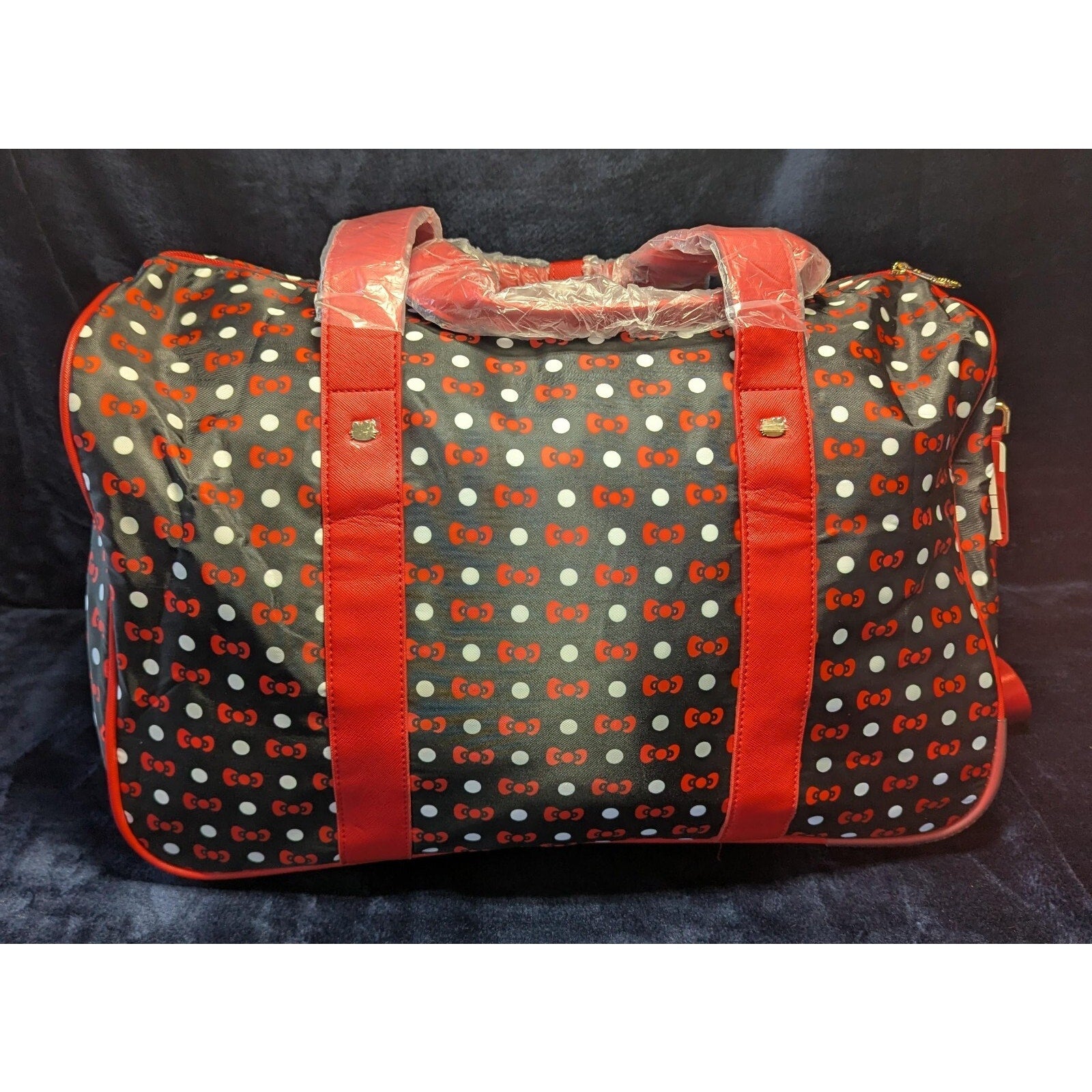 Hello Kitty Carryon Travel/Weekend Bag with Wheels and adjustable handle.