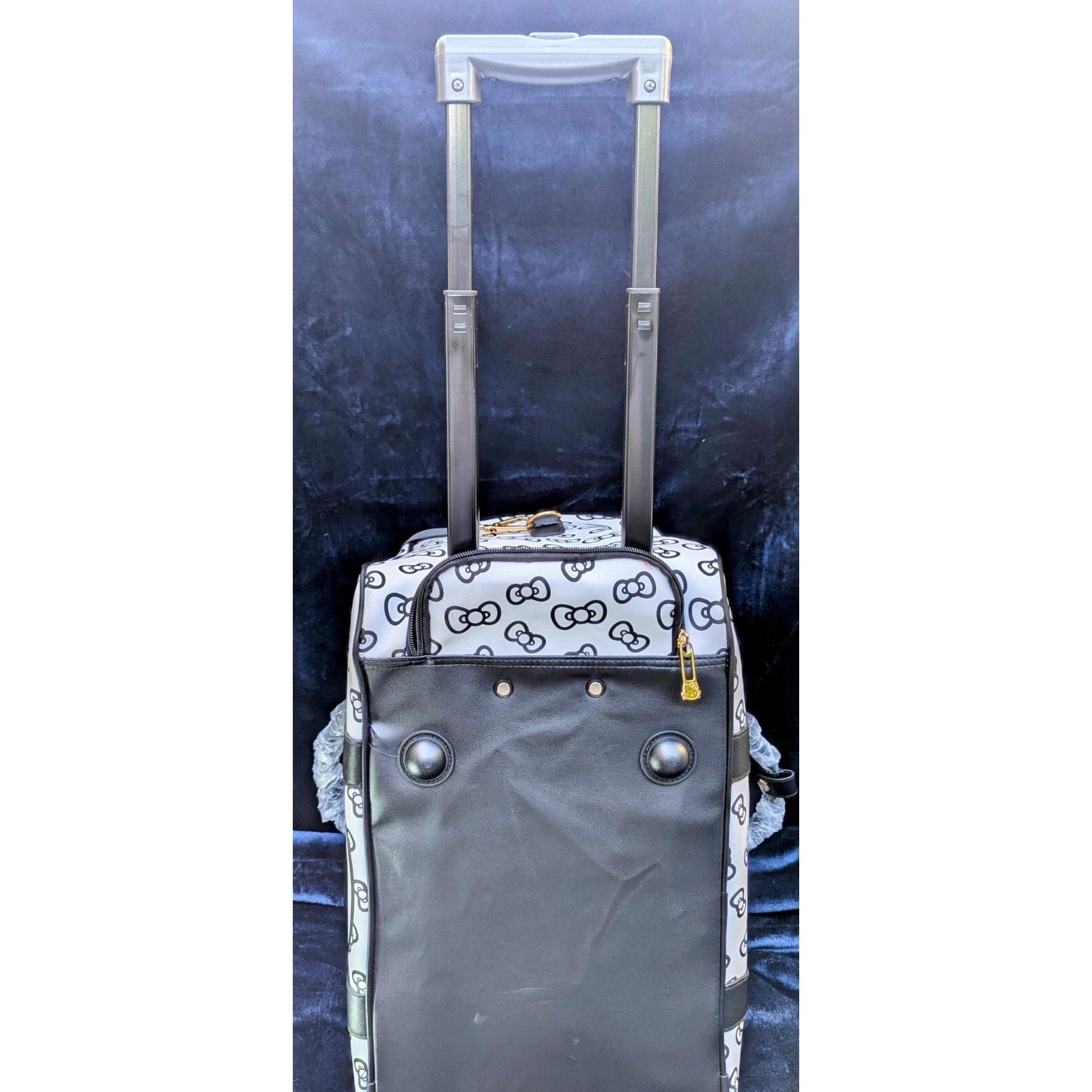 Hello Kitty Carryon Travel/Weekend Bag with Wheels and adjustable handle.