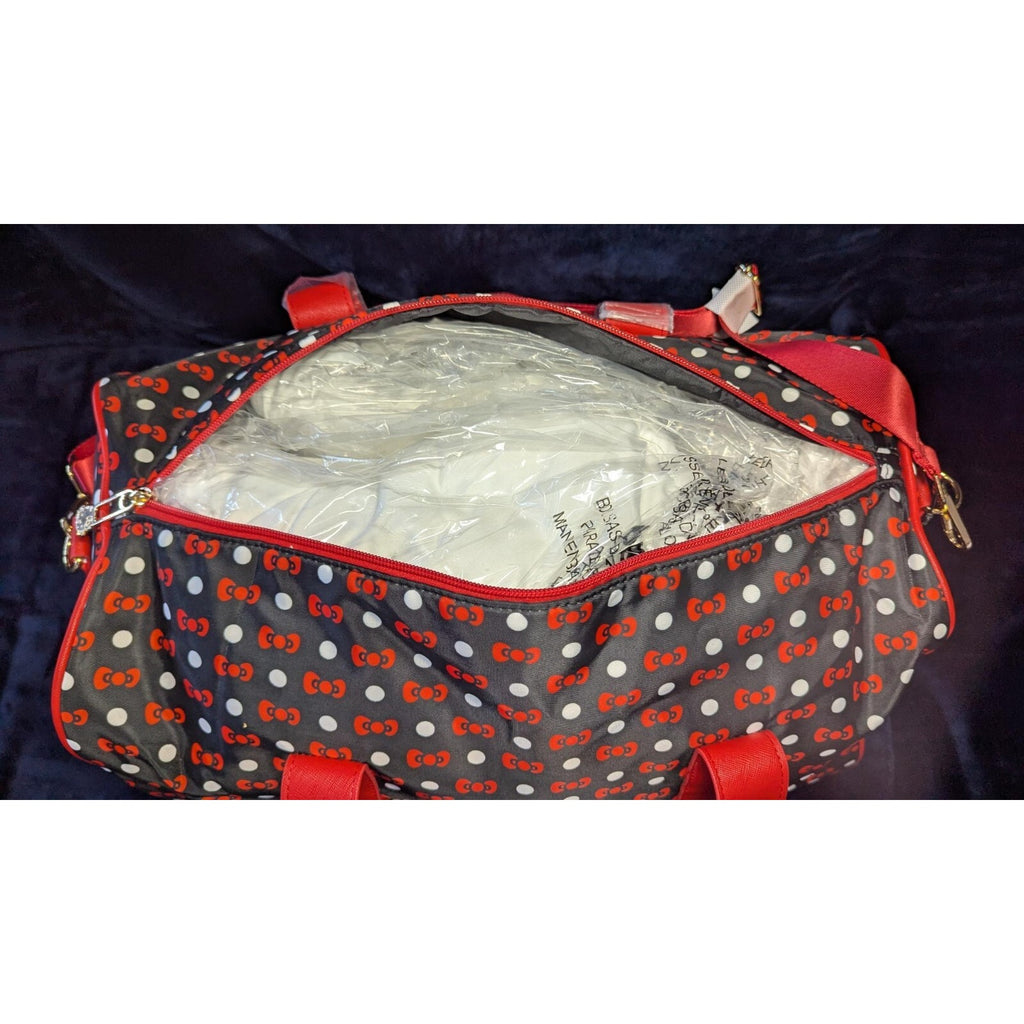 Hello Kitty Carryon Travel/Weekend Bag with Wheels and adjustable handle.
