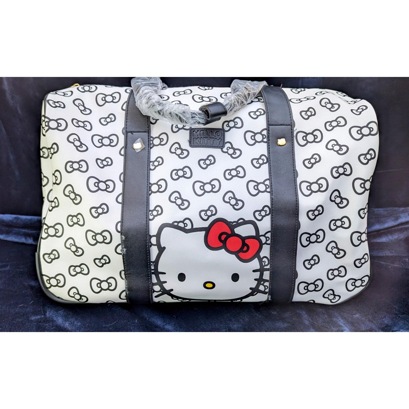 Hello Kitty Carryon Travel/Weekend Bag with Wheels and adjustable handle.