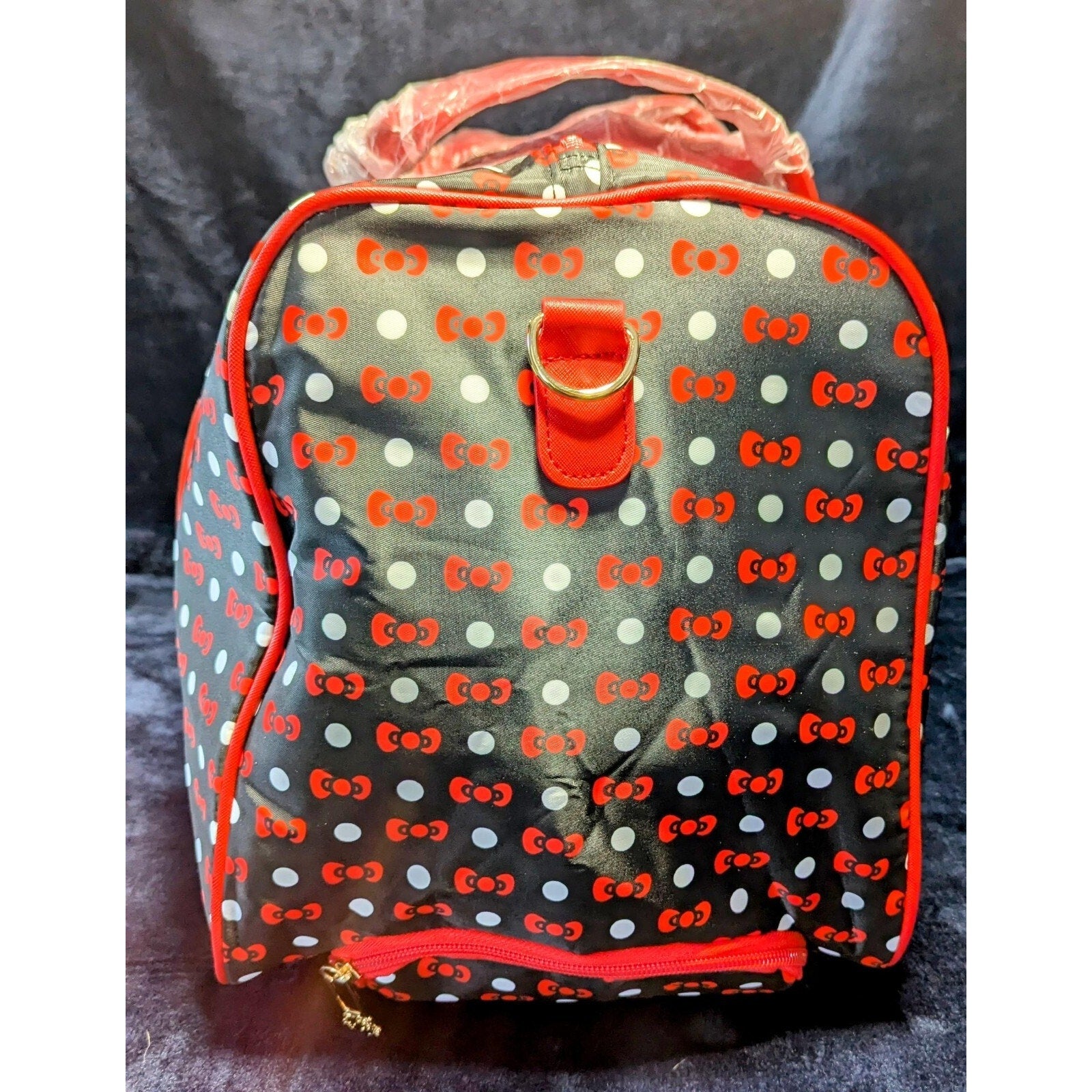 Hello Kitty Carryon Travel/Weekend Bag with Wheels and adjustable handle.